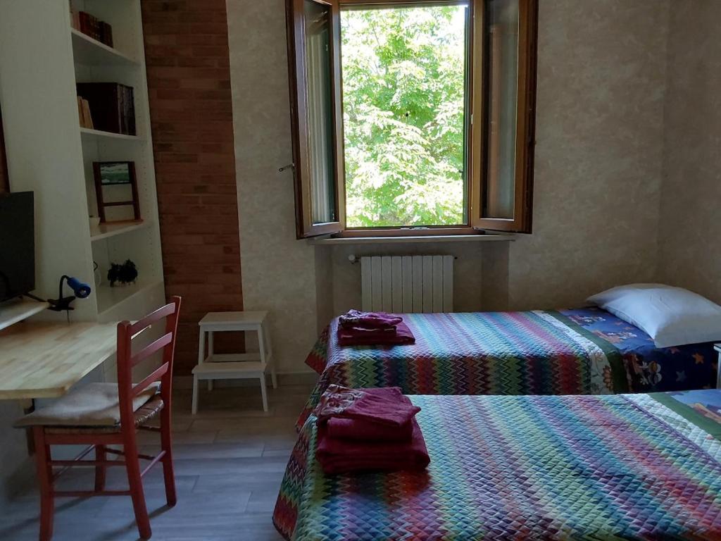 Camera con tre letti singoli